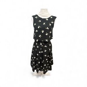 Zara Black  Sleeveless Dress with White Floral Print. Pockets
